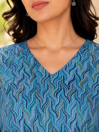 Close up V neck design detail of Rabric blue cambric cotton women short top with soft breathable cotton fabric