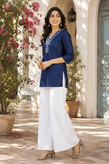 Side angle view of Rabric blue cotton embroidered short top for women with stylish relaxed fit and 3-4 sleeves