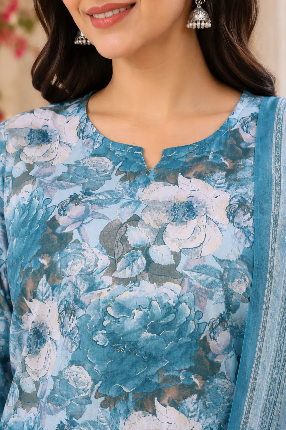 Close up neck design of Rabric blue floral cambric cotton kurta for women featuring elegant round notch neckline