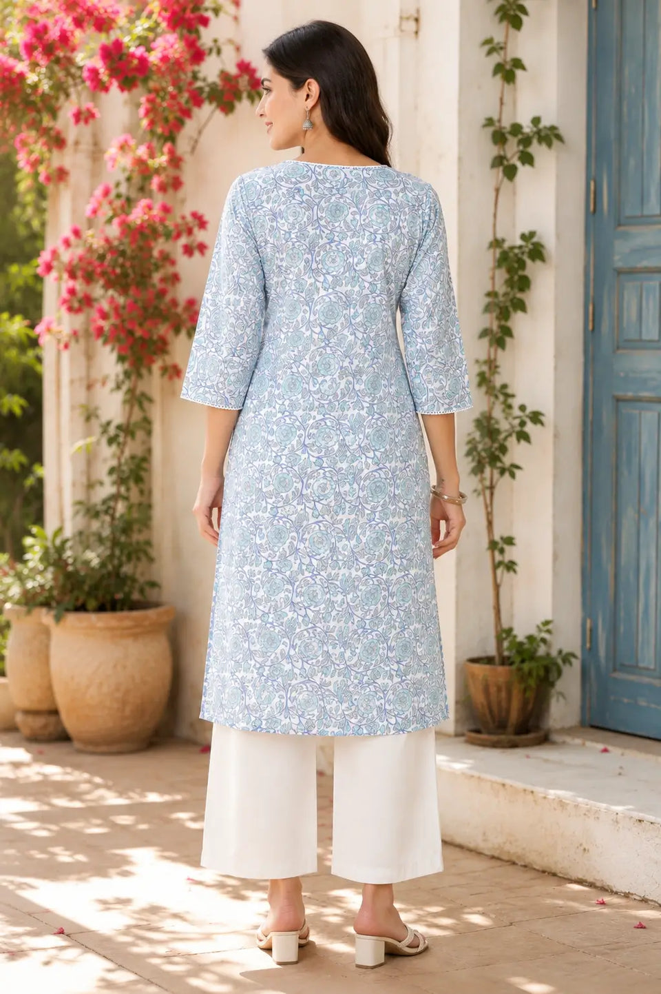 Back view of Rabric blue floral cotton women kurti with elegant straight fit and 3/4 sleeves casual ethnic outfit