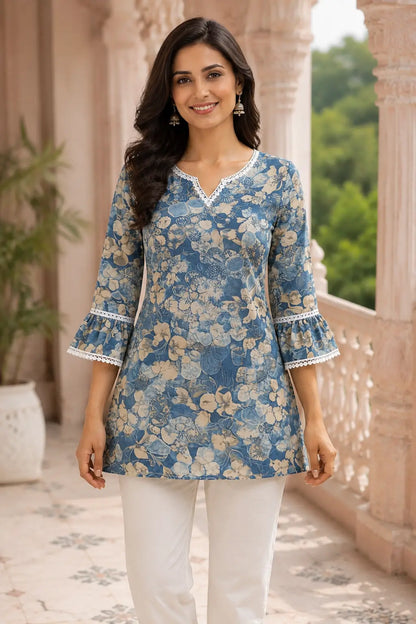 Blue floral cotton short kurti for women by Rabric featuring 3/4 bell sleeves and lace neckline front view
