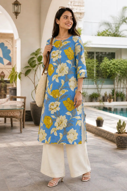 Women wearing stylish blue floral kurta pant set lifestyle front angle