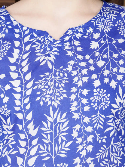 Close-up of floral print blue cotton kurti with brass buttons