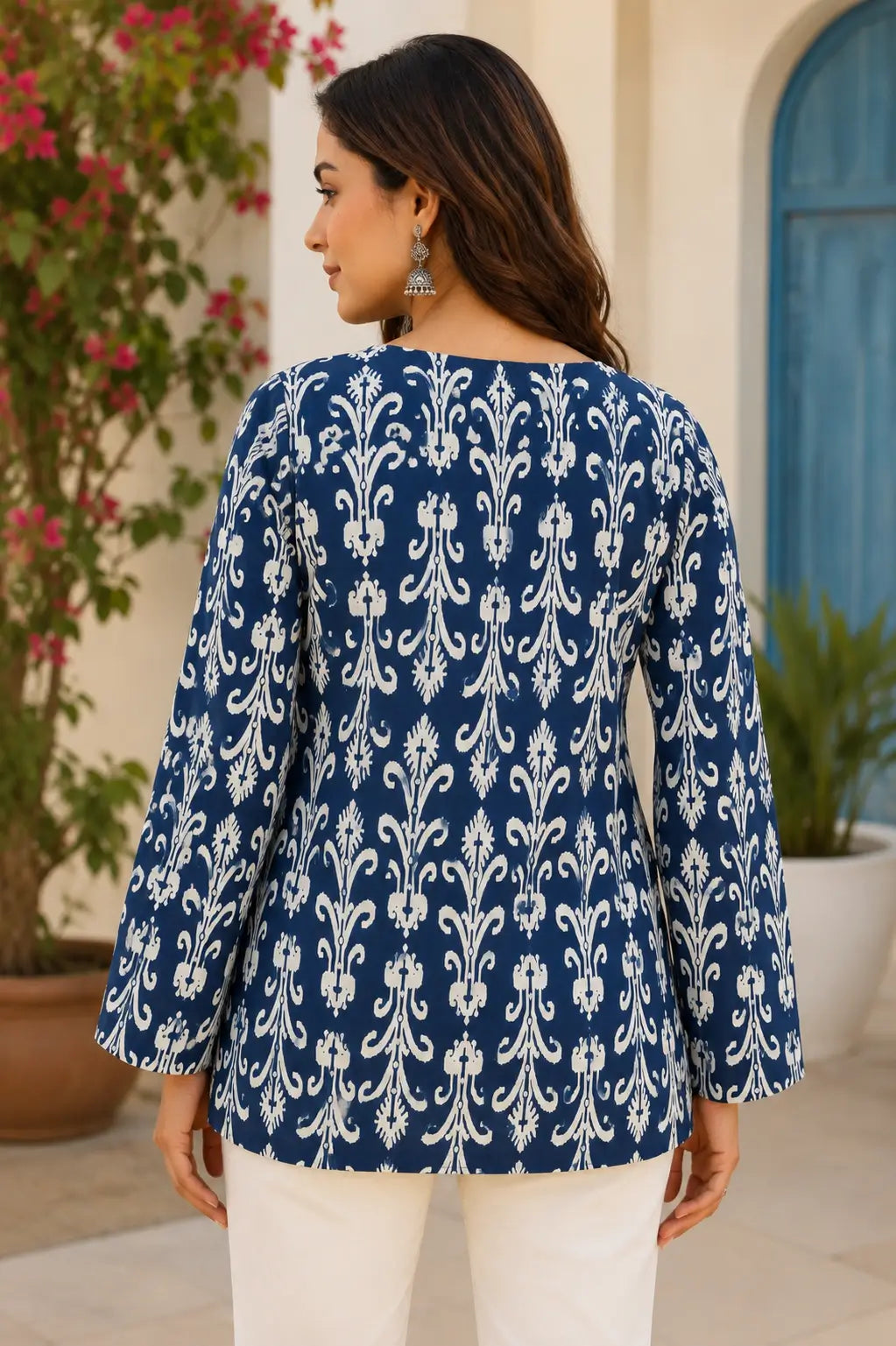 Back view of RABRIC blue and white printed women’s tunic top with relaxed fit