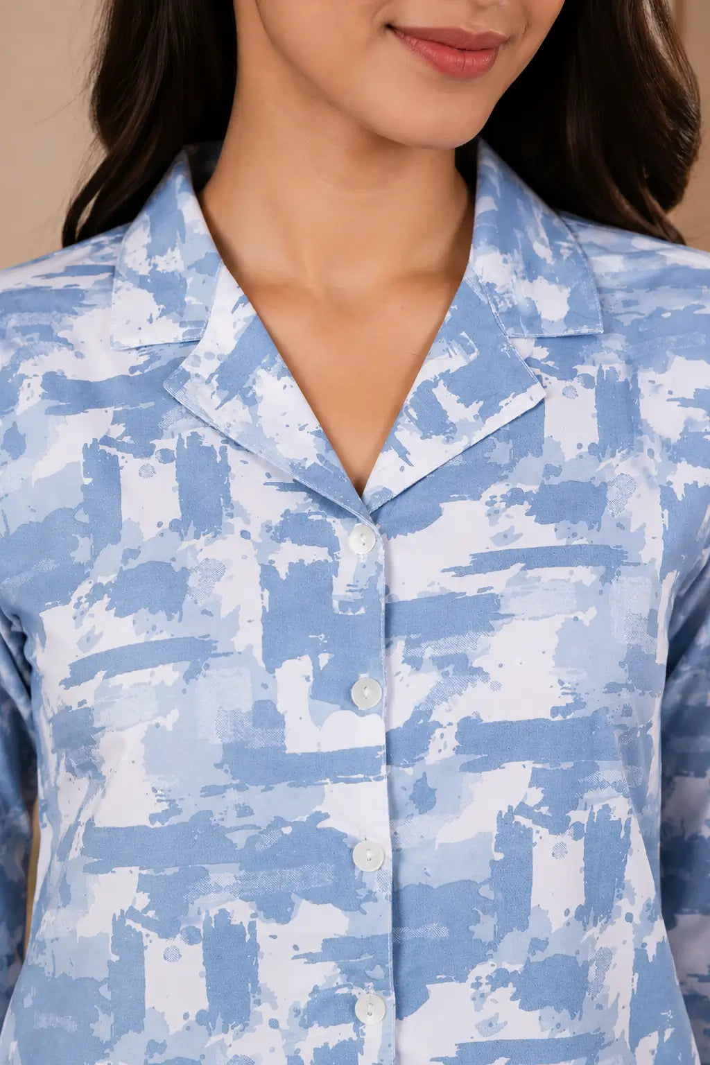 Close-up collar neck design of Rabric blue glace cotton women’s night suit shirt with button-down front