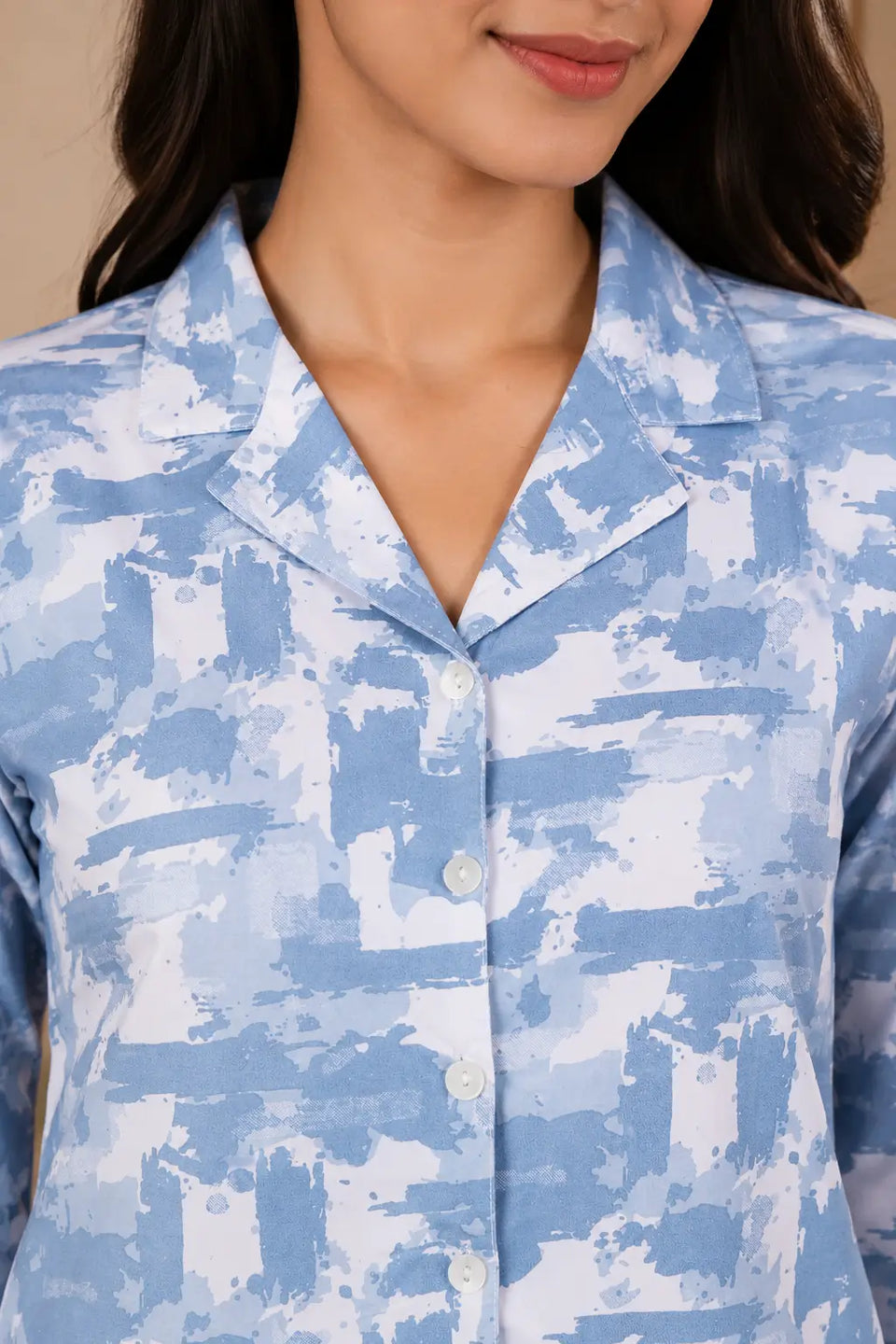 Close-up collar neck design of Rabric blue glace cotton women’s night suit shirt with button-down front
