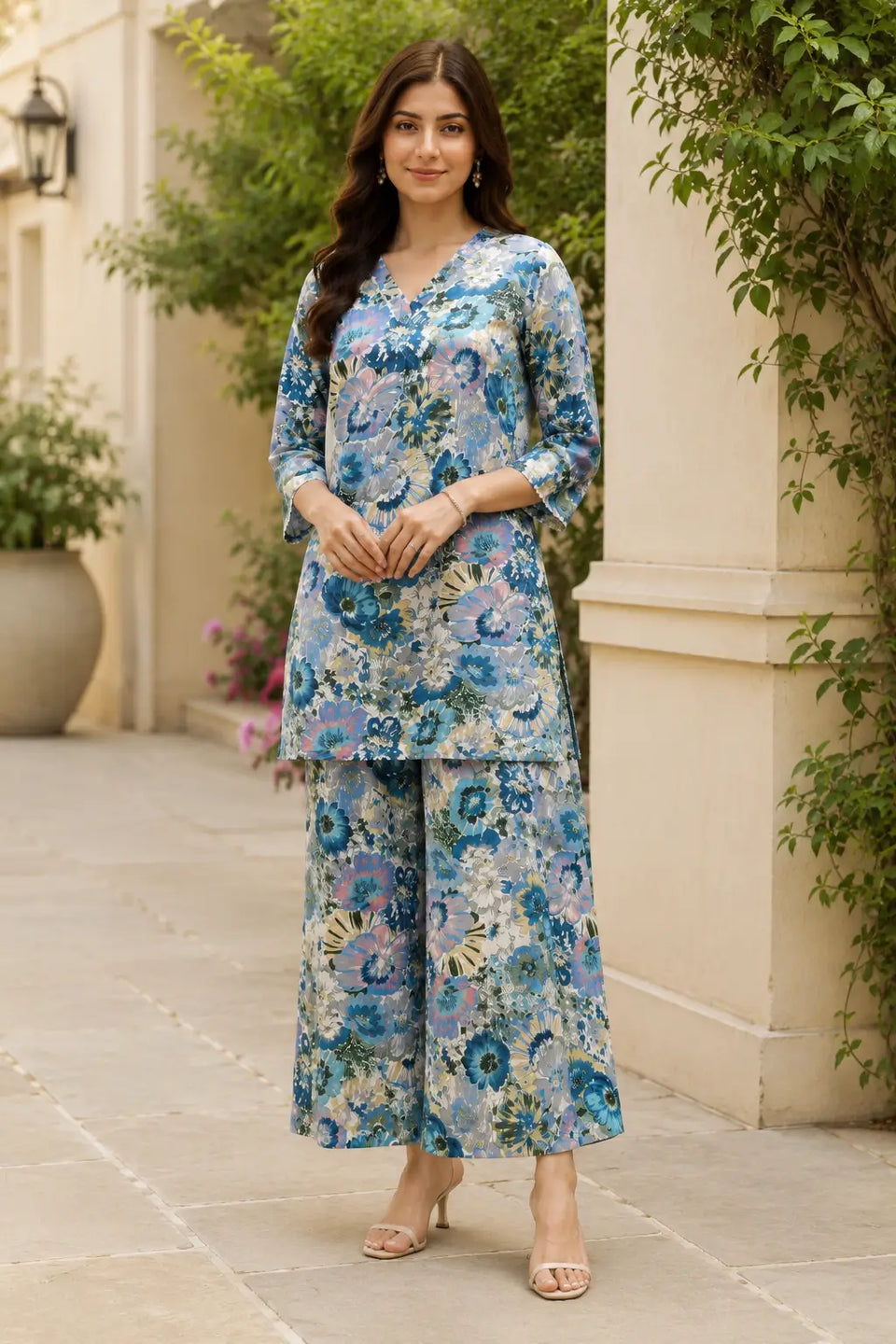 Rabric women's blue multi floral printed cotton co-ord set featuring V-neck short kurta top with 3/4 sleeves and matching wide leg palazzo pants front view