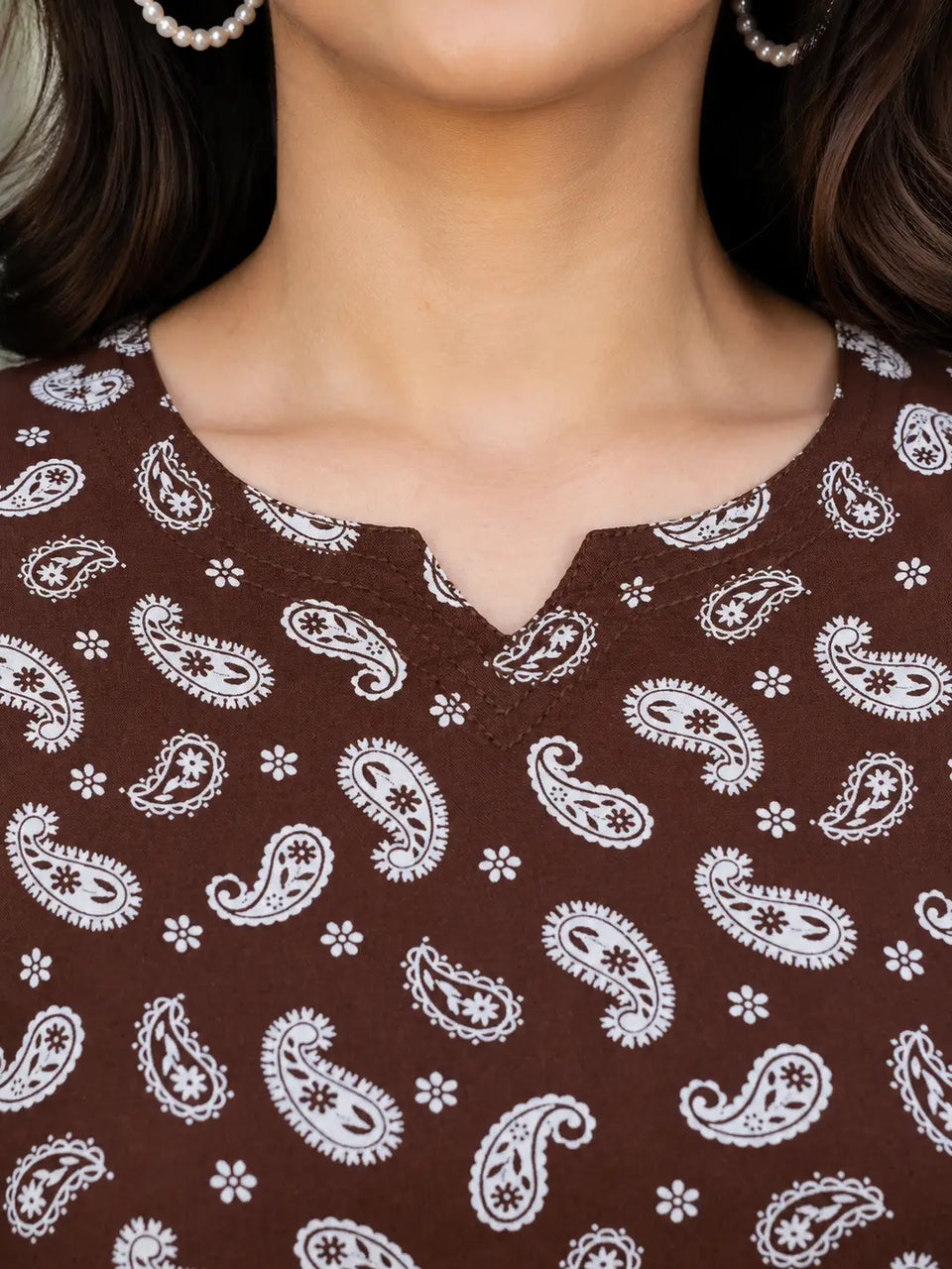 Close up neck design of Rabric brown paisley cotton short top featuring stylish V neck detailing for women