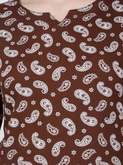 Close-up of White Paisley Print on Brown Rayon Top