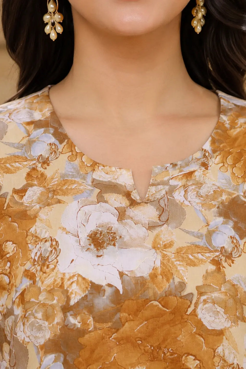 Closeup neck design of Rabric floral cambric cotton women kurta with elegant neckline