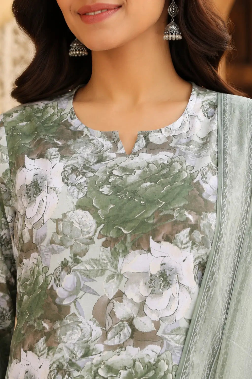 Close up neck design of Rabric sage green cambric cotton floral printed kurta for women with stylish round notch neckline