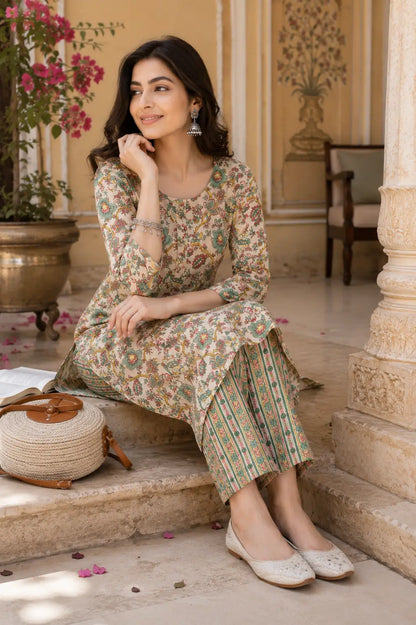 Rabric casual ethnic cotton kurta pant set for women in sitting pose with floral print and comfortable daily wear styling