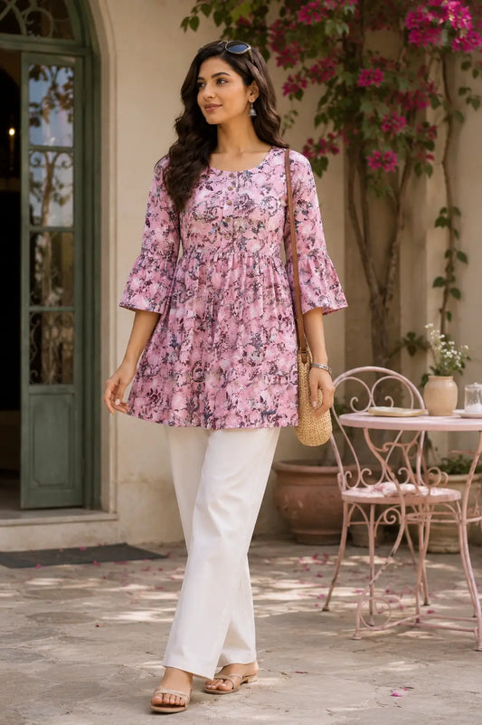 Full look of Rabric pink crepe tunic top paired with stylish white bottoms for modern women fashion