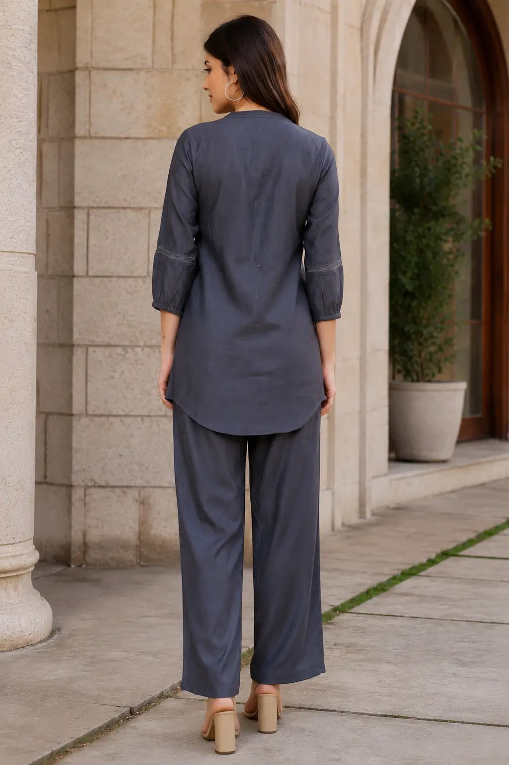 Back view of Rabric charcoal grey Vertican Silk women's co-ord set with clean solid design, 3/4 sleeves and matching straight-fit trousers.