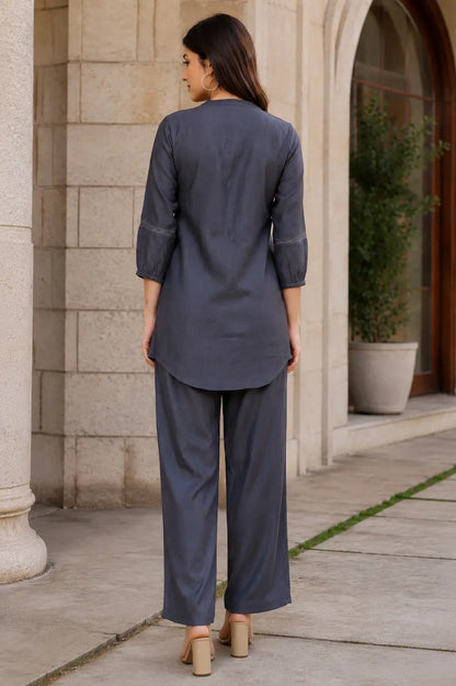 Back view of Rabric charcoal grey Vertican Silk women's co-ord set with clean solid design, 3/4 sleeves and matching straight-fit trousers.