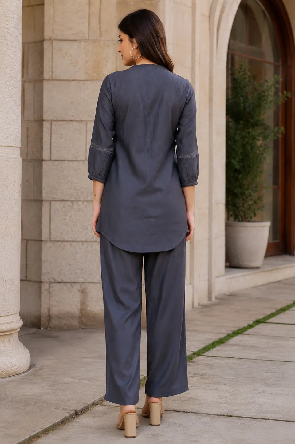 Back view of Rabric charcoal grey Vertican Silk women's co-ord set with clean solid design, 3/4 sleeves and matching straight-fit trousers.