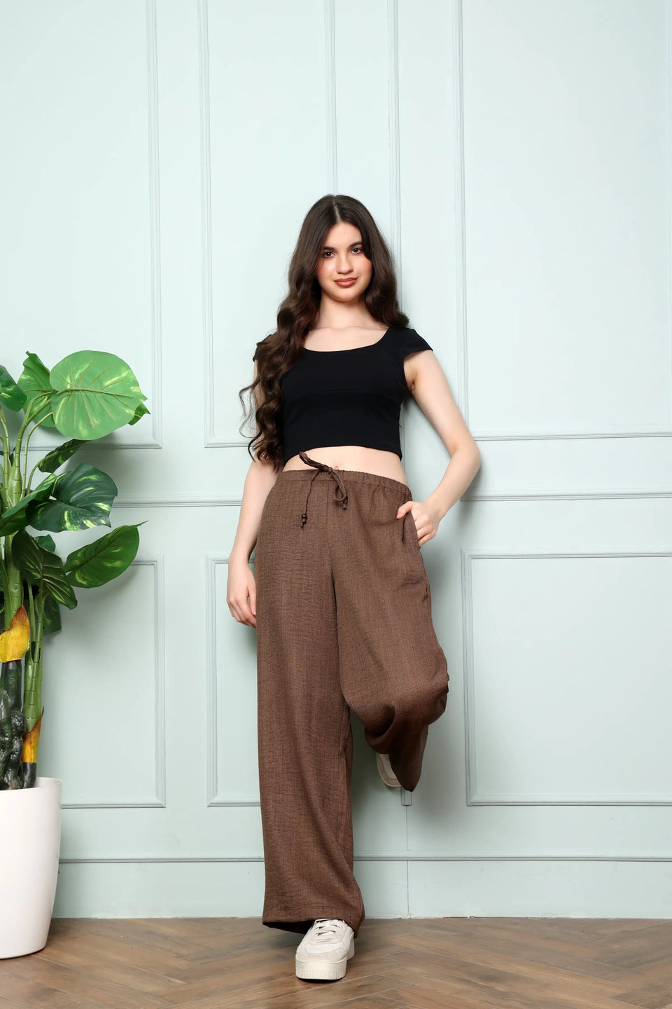RABRIC chocolate brown linen pants for women standing view showing relaxed wide leg silhouette