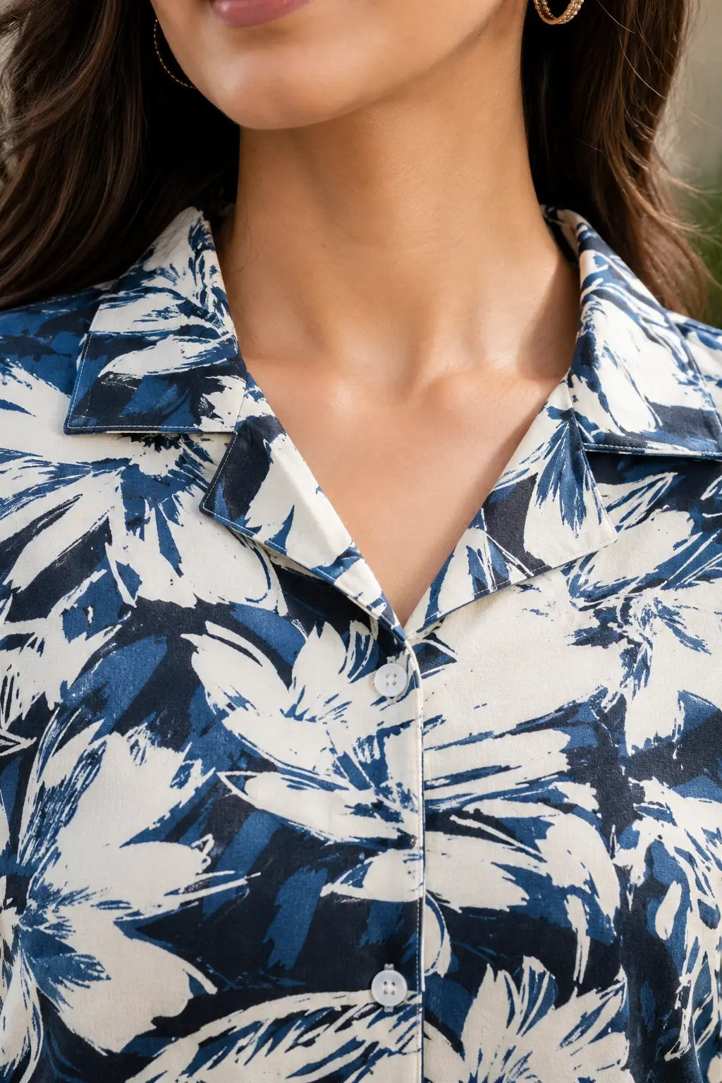 Close up collar neck design of Rabric navy blue cream rayon floral printed co-ord set for women