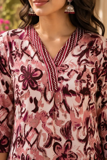 Close up V neck design detail of Rabric pink maroon cotton floral kurta for women ethnic wear