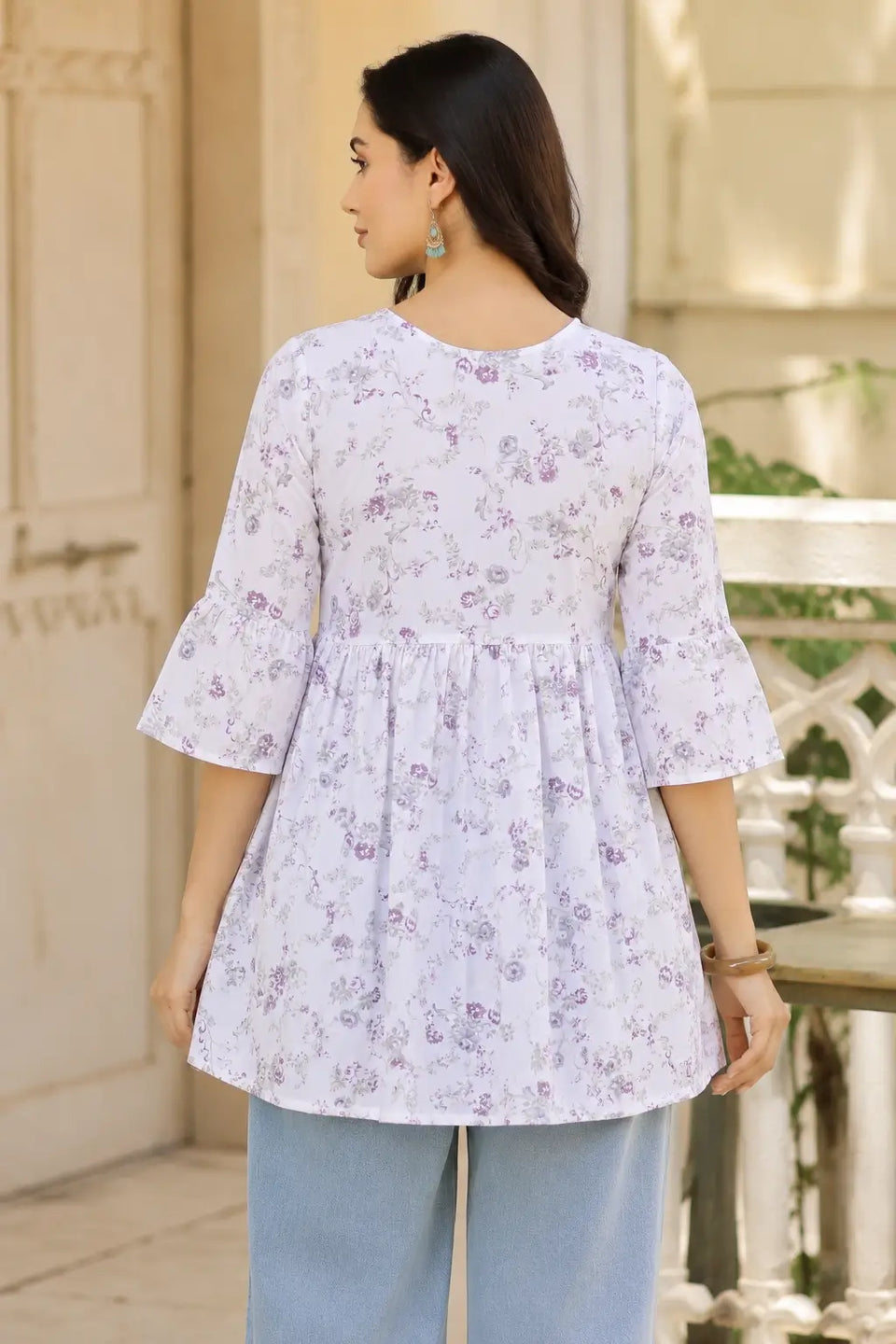 Back view of Rabric cotton floral short top for women featuring soft flare design and 3/4 sleeves