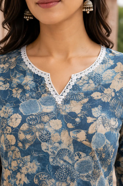 Closeup of lace V-neck design on blue floral cotton kurti for women by Rabric