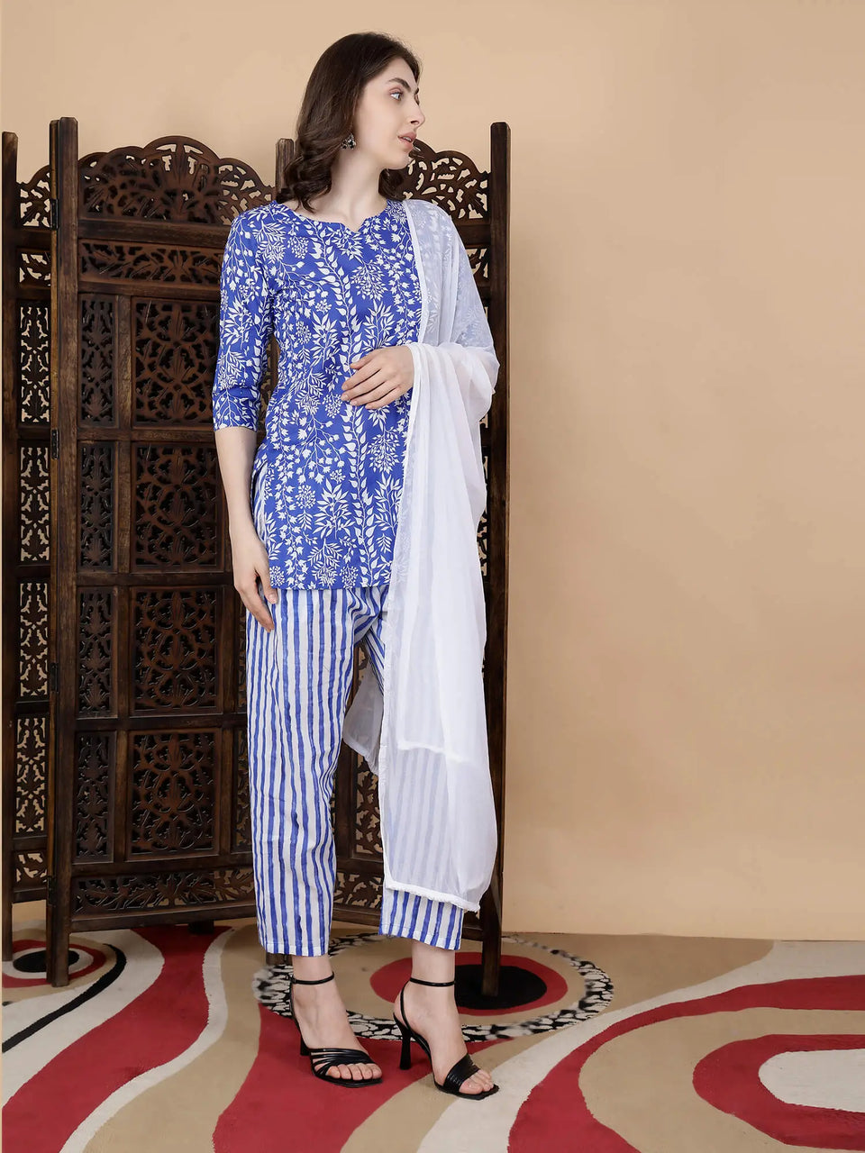 Side view of Rabric premium blue kurti and striped pant set