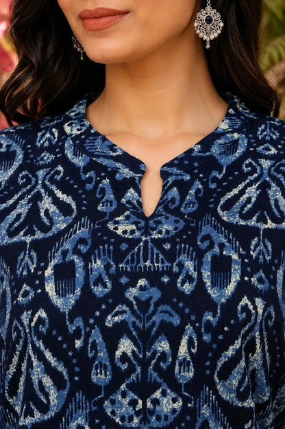Closeup of stylish V neck design on Rabric blue cotton printed women kurti with premium ethnic detailing
