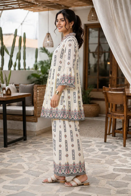 Side view of Rabric off white cotton printed co-ord set for women with relaxed fit kurta, flared sleeves and geometric ethnic print
