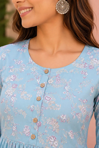 Close up round neck design with wooden buttons on women floral cotton short top