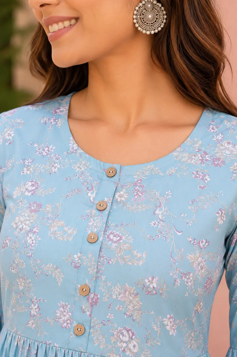 Close up round neck design with wooden buttons on women floral cotton short top