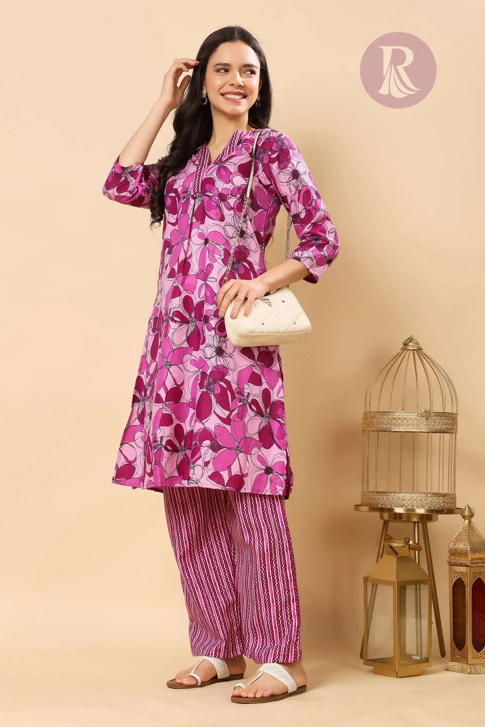 Lifestyle image of Rabric pink floral cotton slub kurta pant set for women