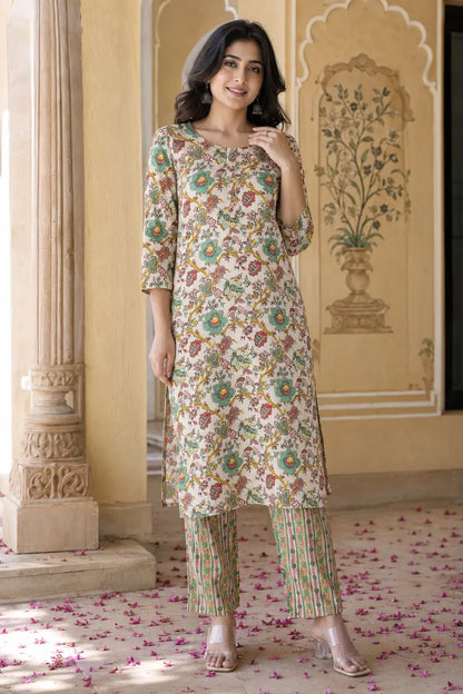 Rabric cream floral cotton kurta pant set for women front view with multicolor printed straight kurta and striped pants ethnic wear