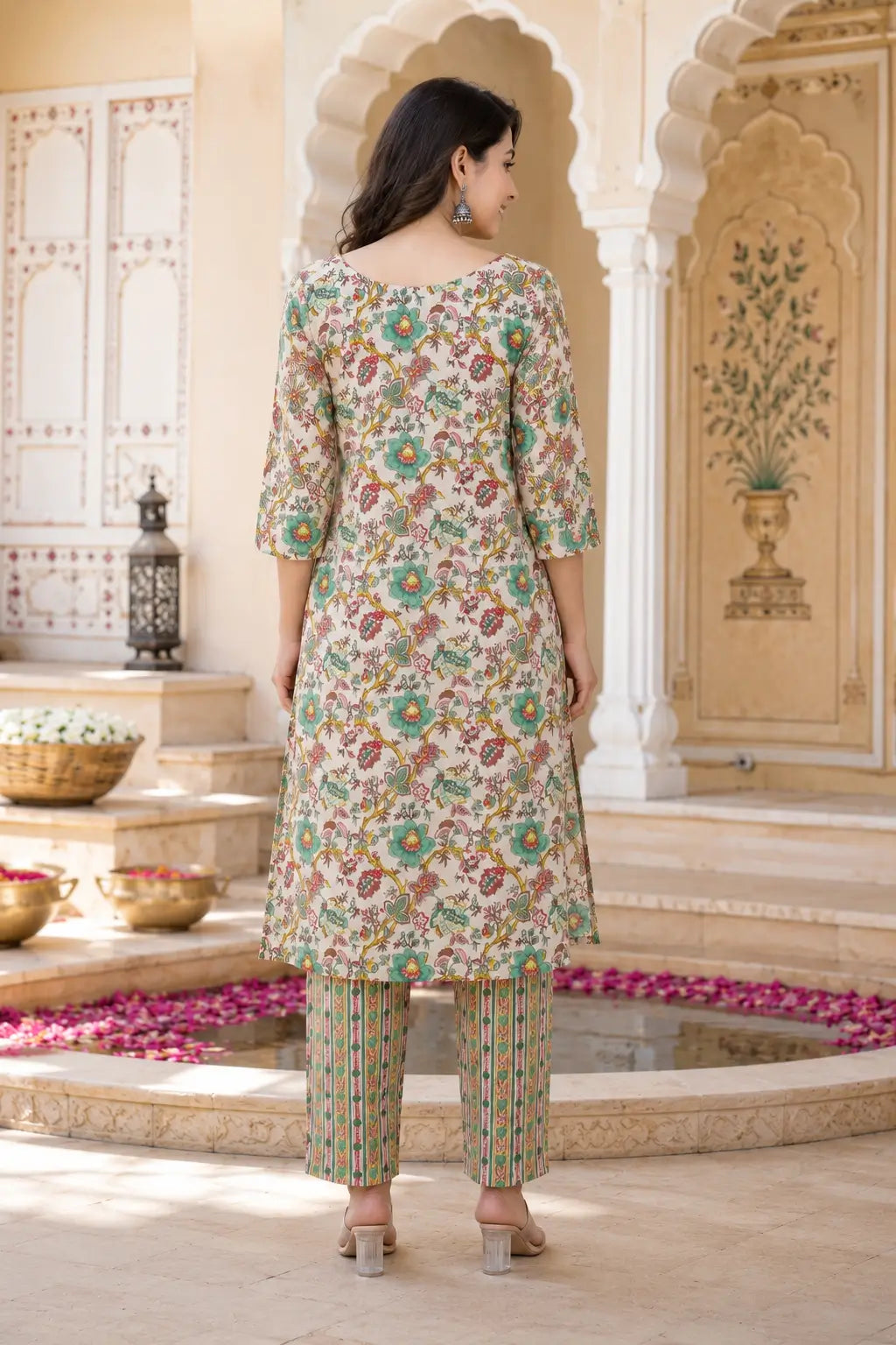 Back view of Rabric cream multicolor floral cotton kurta pant set for women with 3-4 sleeves and straight fit ethnic outfit