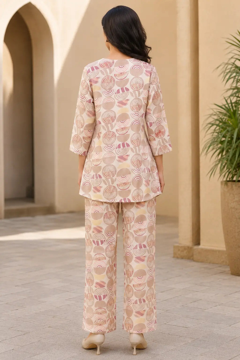 Back view of Rabric cream rayon co-ord set for women with dusty pink abstract geometric circle print and relaxed fit pants