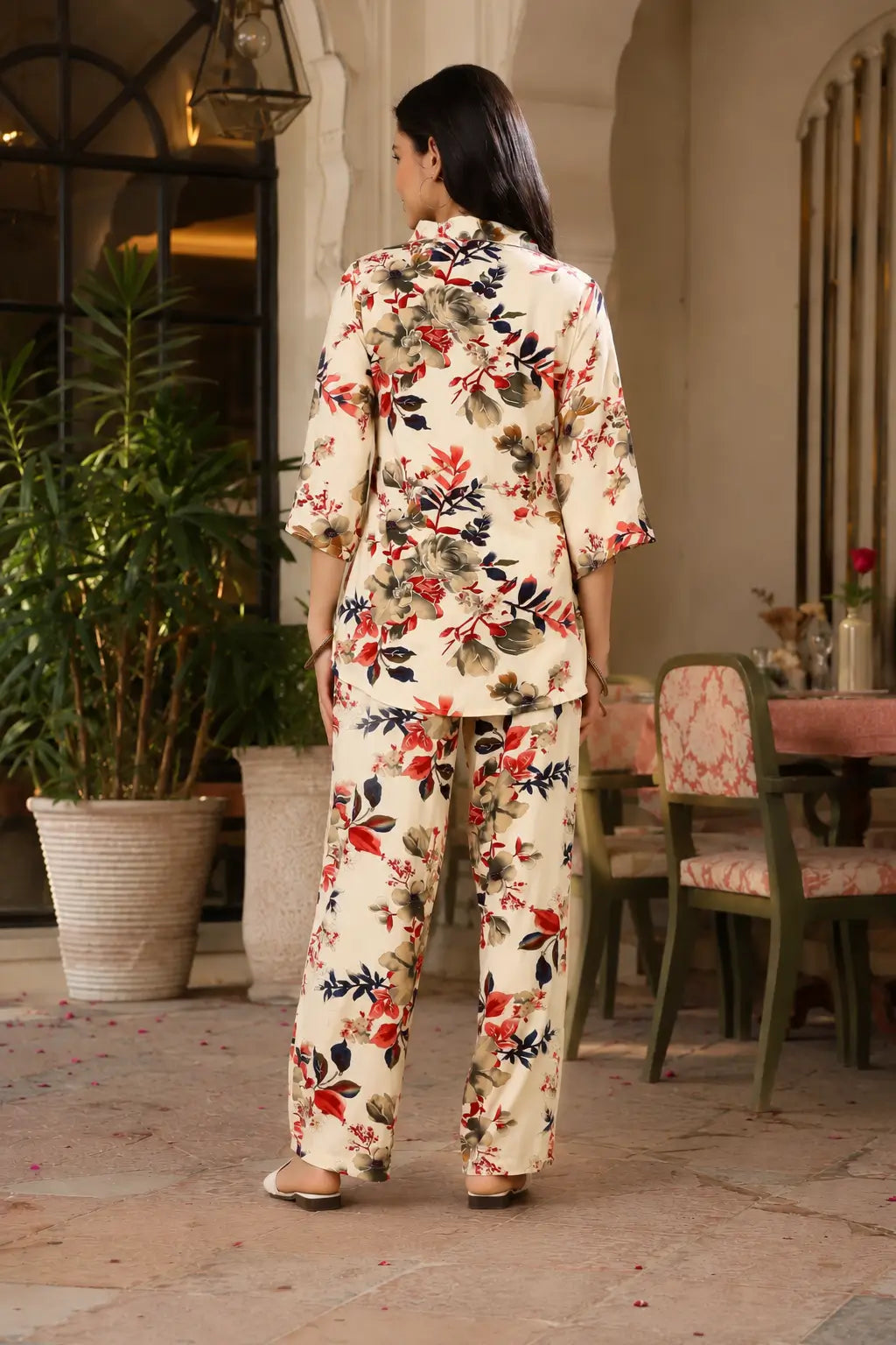 Back view of Rabric cream rayon floral print co-ord set featuring short shirt and straight wide leg pants