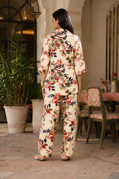Back view of Rabric cream rayon floral print co-ord set featuring short shirt and straight wide leg pants