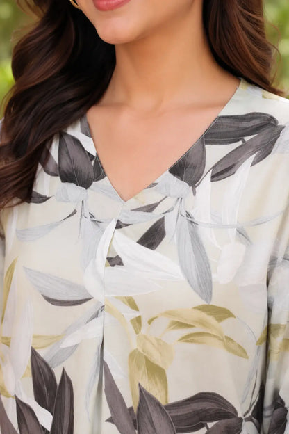 Close-up of Rabric cream rayon V neck co-ord set showing olive grey botanical leaf print and soft fabric texture