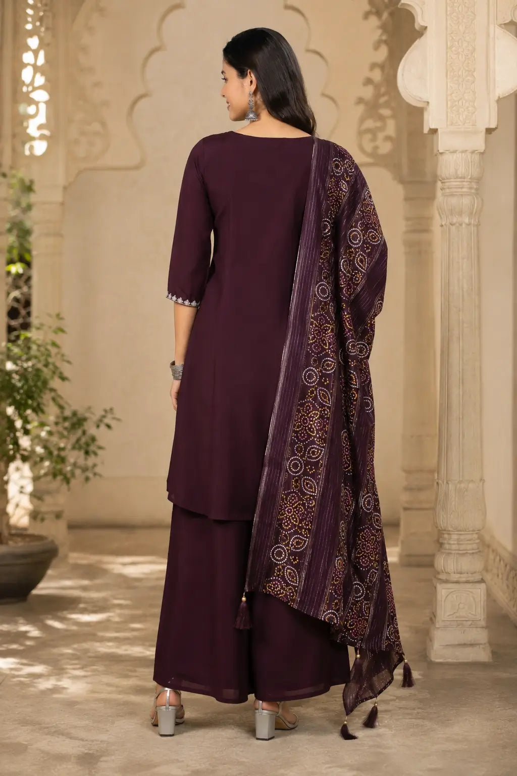Back view of deep wine cotton kurta pant set with dupatta for women by Rabric with long flared kurta and elegant fit