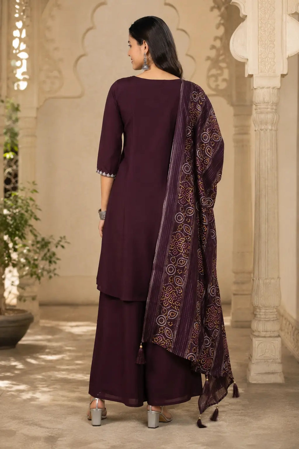 Back view of deep wine cotton kurta pant set with dupatta for women by Rabric with long flared kurta and elegant fit