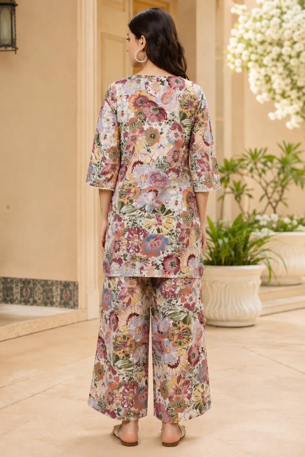 Back view of Rabric floral printed cotton co-ord set in dusty pink, peach and lavender floral pattern with short top and wide leg palazzo pants for women.