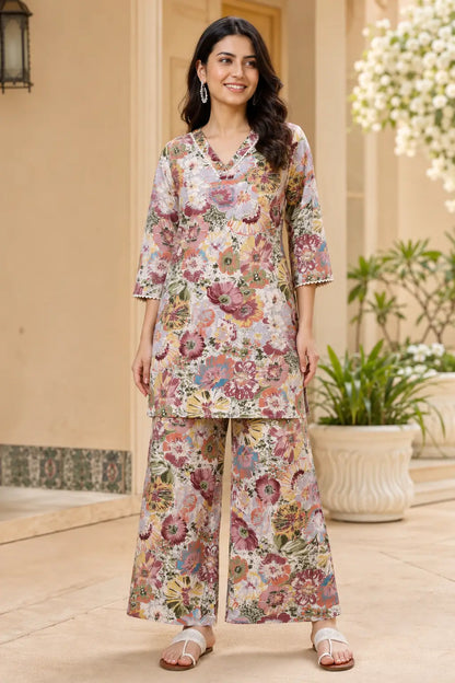 Rabric dusty pink mauve floral print cotton co-ord set for women featuring a V-neck short kurta style top with 3/4 sleeves and matching wide leg palazzo pants for summer daily wear.