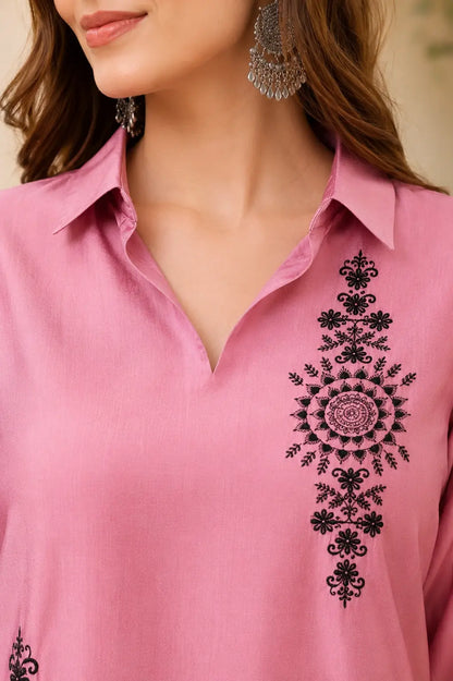Close-up of collared V-neck design on dusty pink Vertican Silk women's co-ord set with intricate black floral embroidery.