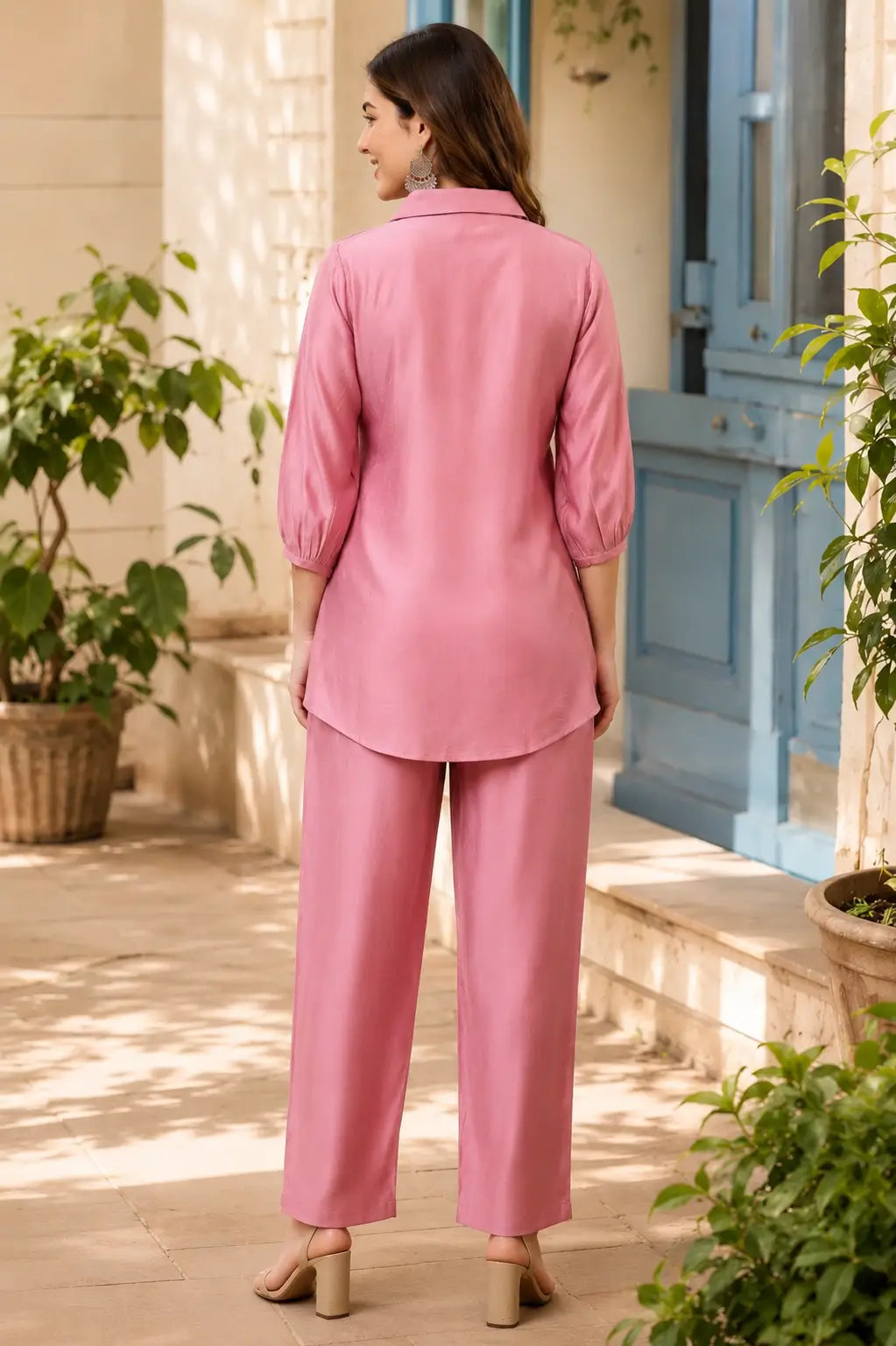 Back view of Rabric dusty pink Vertican Silk co-ord set for women with 3-4 sleeves, collared shirt and straight fit trousers.