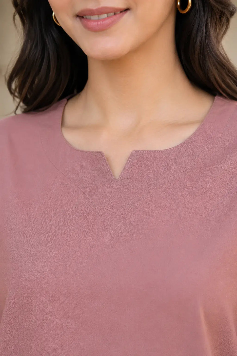 Close up of Rabric dusty rose cotton co-ord set for women showing notch neck design, plain solid fabric texture and neat stitching