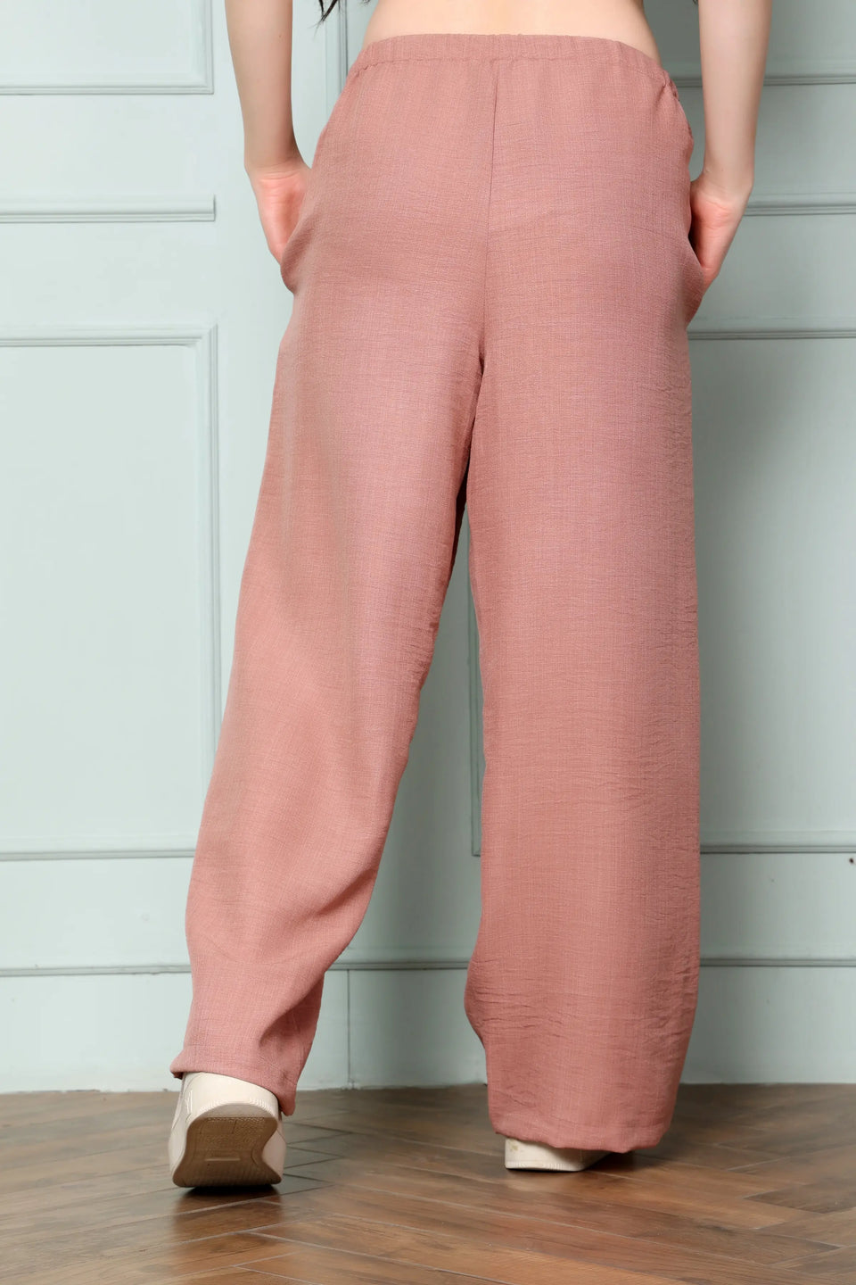 RABRIC dusty rose linen wide leg trousers for women back view showing relaxed broad fit