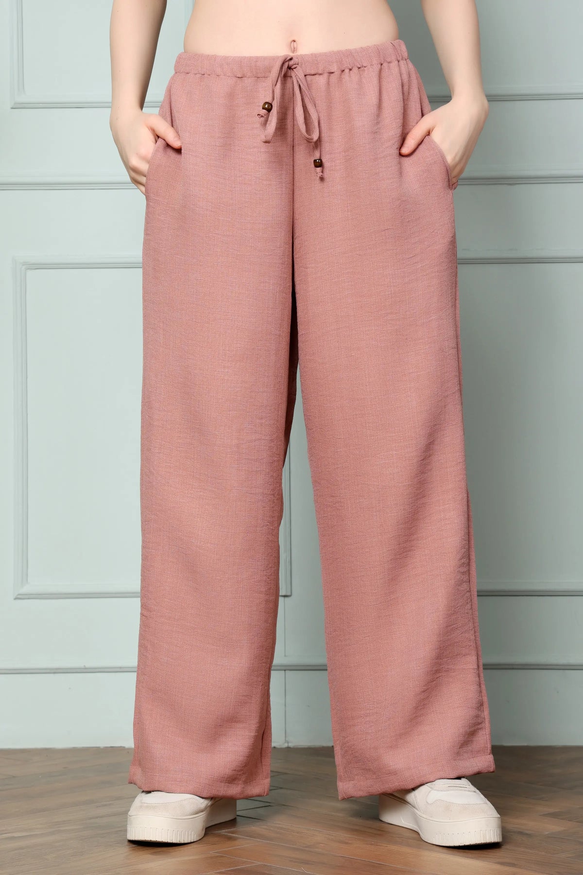 RABRIC dusty rose linen wide leg trousers for women front view with drawstring waist and pockets