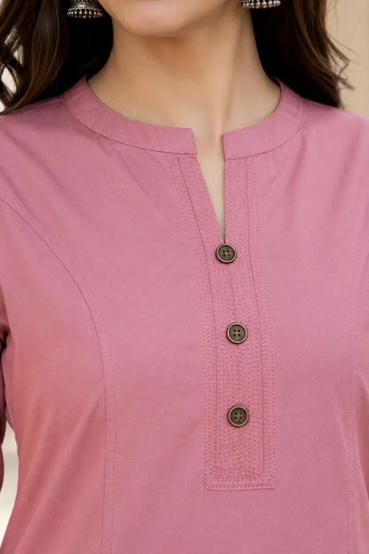Close-up of Rabric dusty rose pink rayon solid kurti showing mandarin notch neck, stitched button placket and fine fabric detailing