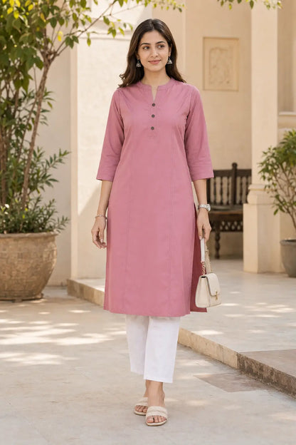 Rabric dusty rose pink rayon solid straight kurti for women with mandarin neck, button placket, 3/4 sleeves and white pants front view