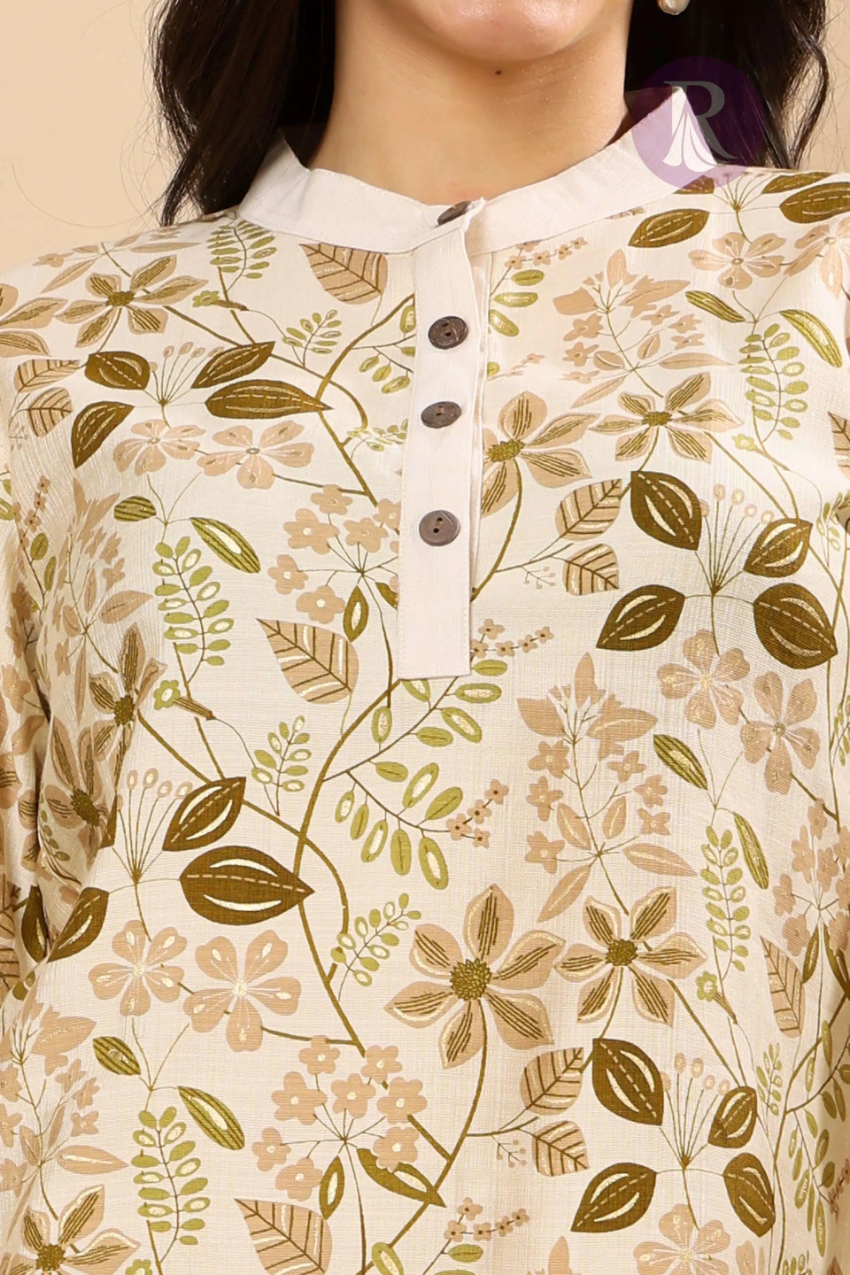Closeup of elegant mandarin collar and button placket on Rabric floral printed kurta pant set for women