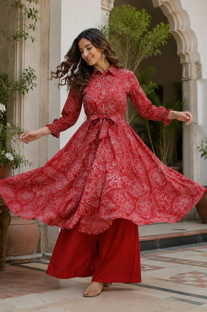 Full flair view of Rabric vertical silk floral kurta in dancing pose lifestyle shoot